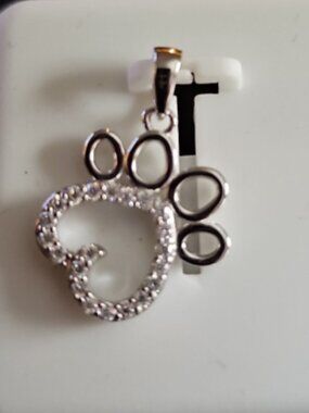 Cute .50ctw sterling silver puppy paw pendant $200 retail